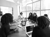 Students sitting around a table