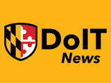 UMBC Shield on a gold background with the text "DoIT News" beside it.